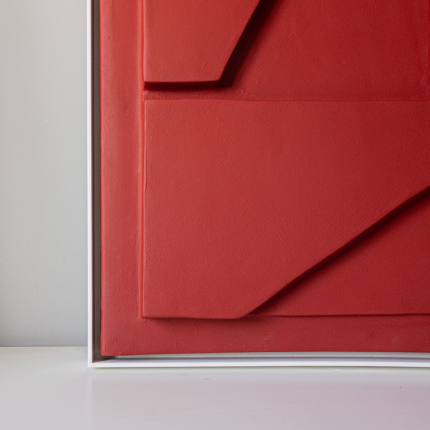 RED SCULPTURAL WALL ART - MiSo Architects