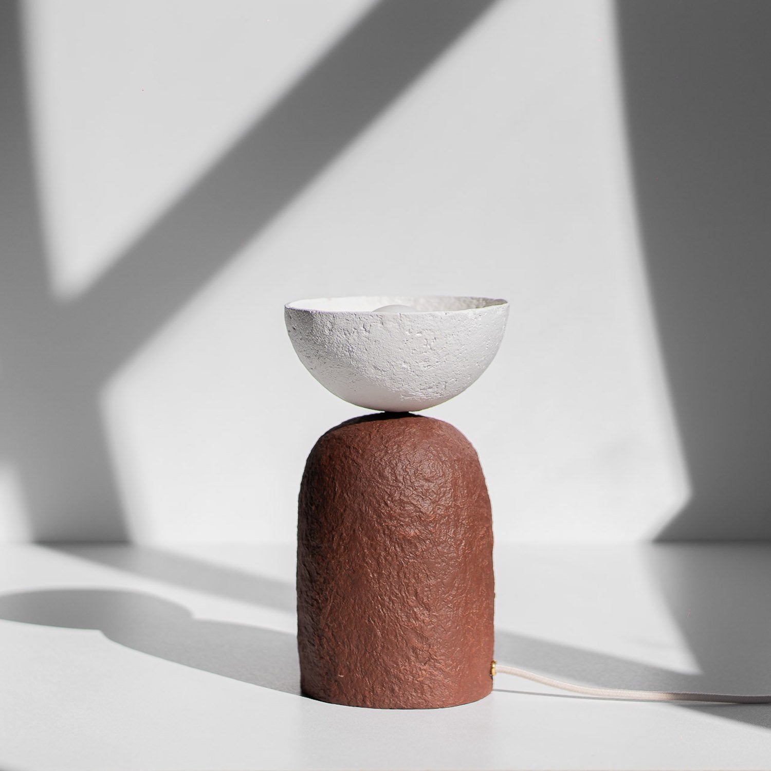 Organic paper mache reversed mushroom table lamp with beige relief sculpture texture in two colors white and earthy red