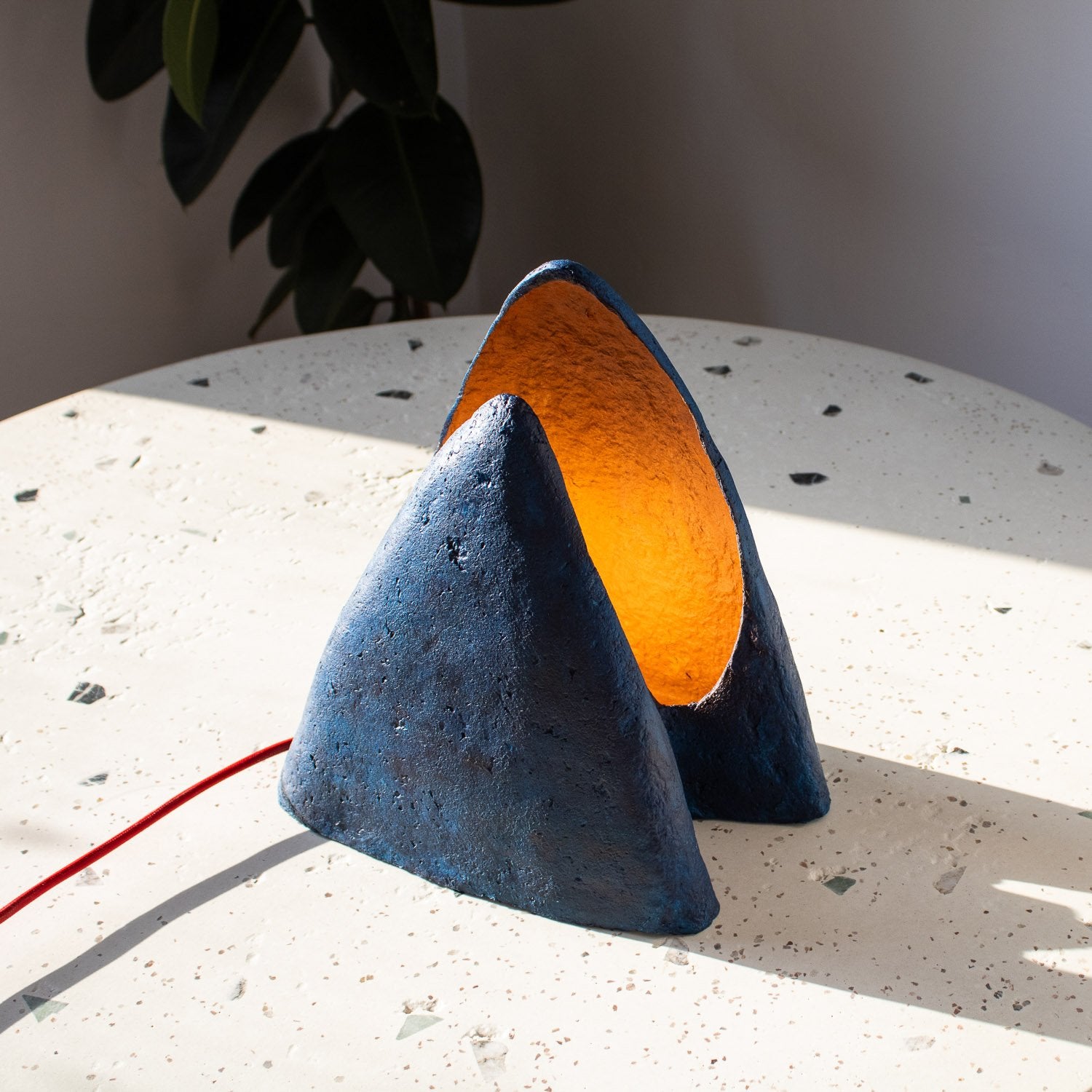 dark blue paper mache with soft texture table lamp, cone-shaped, triangle like mountain. 